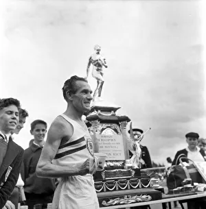Kinnaird Trophy Meeting at Chiswick, Athletics Gordon Pirie wins the 3000 meters