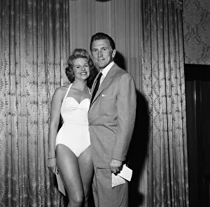 Kirk Douglas selects 21-year-old Marilyn Davies as the winner of the Viking Beauty
