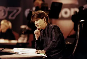 00144 Prints: Kirsty Wark TV Presenter during Election results program sitting at desk in studio hand