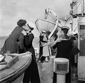 Kissing - Sailors and Wives on return of H. M. S. Flamingo from Persian Gulf