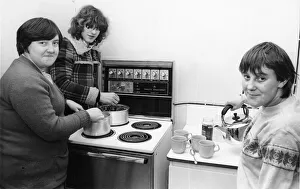 00054 Prints: Kitchen crew, Julie Gibson, Stephen Johnson and Anne Charlton working to ease