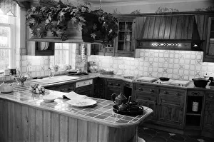 Kitchen in a show house of Dulwich Gate'. Prime Minister Margaret Thatcher