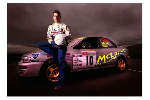 Knockhill race course rally driver May 1998 sits on car holding helmet