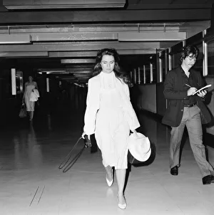 Photographer Prints: Koo Stark, Actress arriving at London Heathrow Airport, Wednesday 10th August 1983