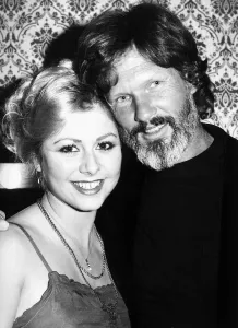 Necklace Prints: Kris Kristofferson country singer and actor in April 1982 with gymnast Suzanne Dando