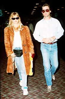 00131 Prints: Kurt Russell actor with Goldie Hawn actress at Heathrow Airport DBase MSI