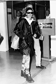Kylie Minogue singer actress arriving at London Airport A©Mirrorpix