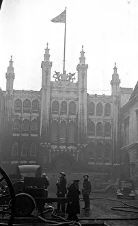 00168 Prints: L. F.s Firemen attend a fire in the city of London on Sunday night near the Guildhall