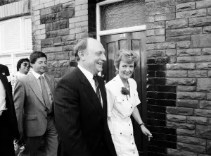 01380 Prints: Labour leader Neil Kinnock and his wife Glenys go to cast their vote in the 1987 general