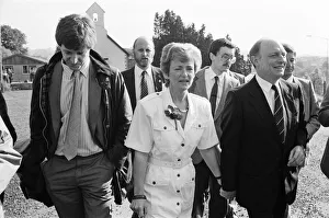 01380 Prints: Labour leader Neil Kinnock and his wife Glenys go to cast their vote in the 1987 general