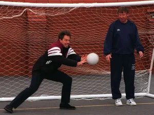 Labour leader Tony Blair keeps goal during a visit to a football training session