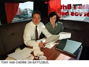 Images Dated 1st April 1997: Labour leader Tony Blair with his wife Cherie on the Labour Partys battle bus. April 1997