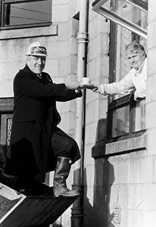 Labour man Bob Gillespie gets a quick cup of tea from supporter Mrs Margaret McGlip in