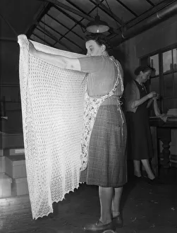 Light Prints: A lace shawl seen here undergoing quality control at The Shawl Factory of GH Hurt