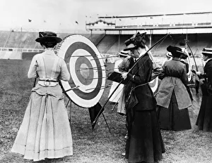 Games Prints: Ladies competing in an archery contest at the Olympic stadium in London 1908