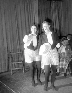 Old People Prints: Two ladies performing on stage during a pearly kings and queens concert party