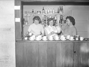 Core23 Prints: Ladies pour the tea, ready for the rush at half-time during the Motoball match