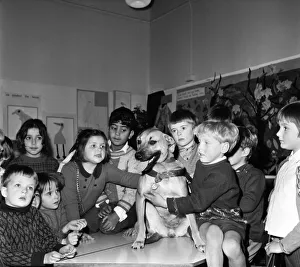 Lady with some of the children of Primet Primary school, Colne today. Z11251-002