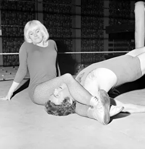 Lady wrestler Mitzi Mueller seen here taking on Colin Wills