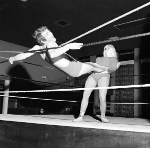 Lady wrestler Mitzi Mueller seen here taking on Colin Wills