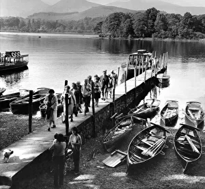 Lake District Prints: Lake District - Derwentwater - Holidaymakers disembark at Keswick after a cruise