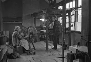 Textiles Prints: Lancashire weavers seen here spinning and weaving in their workshop in Northern England