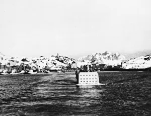 Mountains Prints: A landing craft returning to its parent ship following the successful raid on the Lofoten