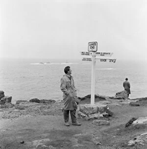 01318 Collection: Lands End, West Cornwall, England. Picture shows the famous signposts