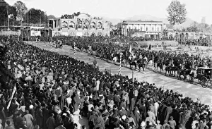 Large crowds gather to watch royal procession after coronation of Reza Shah Pahlevi