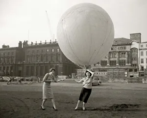 Balloonist Prints: A Large helium filled balloon is raised over the site of the new picadilly centre to show
