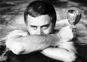 Bathing Prints: Larry Hagman Actor in a jacuzzi on the edge with crossed arms April 1980