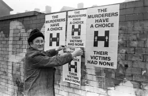 Northern Ireland Prints: Launch Of Poster Campaign To Highlight Victims Plight Mr Tom Passmore putting up