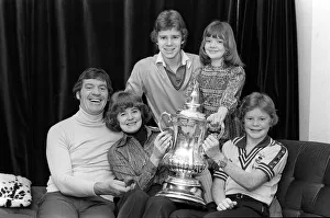 Laurie McMenemy football manager with his wife and children holding the FA Cup