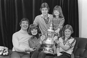 Core90 Prints: Laurie McMenemy with his wife and children holding the FA Cup at their home 14 / 2 / 77