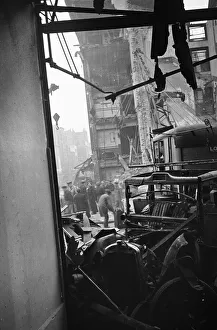 01483 Prints: LCC and Civil Defence workers seen here clearing up following a V2 explosion at the Red