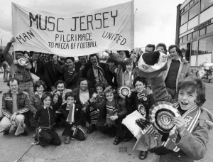 Cheering Prints: Leading the cheers from the New Jersey branch of the Manchester United supporters club is