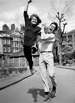 Leading Cliff a dance! Girl leading Cliff Richard in a light-hearted