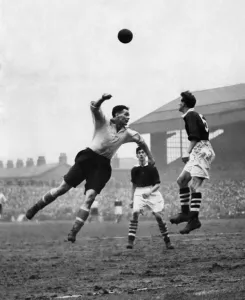 Leading lights at Turf Moor-Liddell of Liverpool who had moved into the centre forward