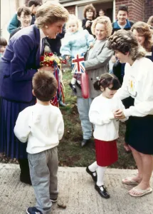 Cleveland Prints: Leanne Venison finds it a little to much to present a posy to Princess Diana during her