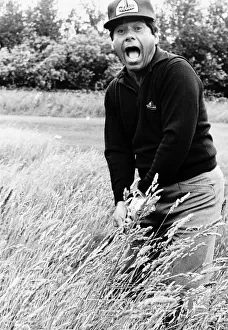 00189 Prints: Lee Trevino with an open mouthed look of shock which conveys his feelings about
