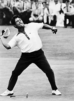 Lee Trevino throwing his hat after taking the putt which won him the Open Championship