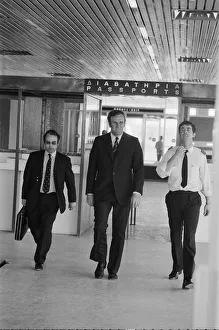 00246 Prints: Leeds United manager Don Revie goes through passport control in Greece as the team return