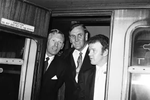 Leeds United manger Don Revie with Billy Bremner and Syd Owens at Leeds station before