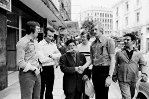 Moustaches Prints: Leeds United players meet a local man with a huge moustache as they take a walk around