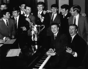 Song Prints: Leeds United Team celebrate their Wembley victory at the Royal Garden Hotel after
