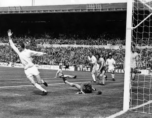 00253 Prints: Leeds V West Brom Alan Clarke scores Leeds first goal and turns away in triumph with West