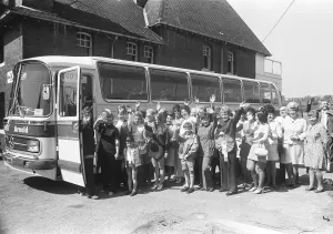 Leeds wives and children board the coach bound for Wembley to watch their husband play