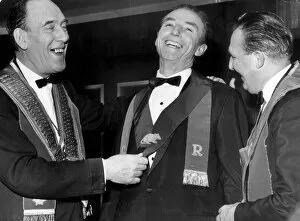 01428 Collection: Left, Comedian and football club chairman, Tommy Trinder puts the honour sash around