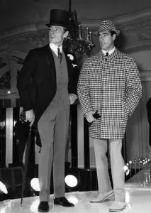 Left morning coat in black lambs wool with tan gaberdine waist-coat and trousers