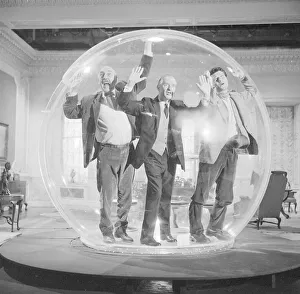 Left to right Lionel Jeffries, Eric Portman and Laurence Harvey seen here on the set of